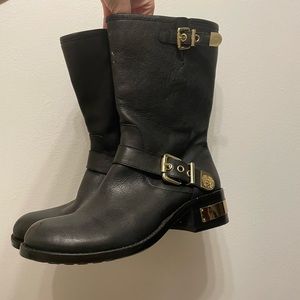 Black Vince Camuto boots with gold trim